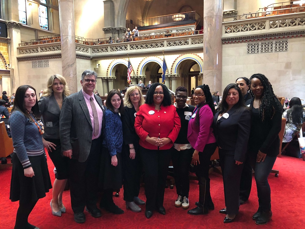 Almost two dozen GSSW students visited the state capital for the annual Social Worker Legislative Education and Advocacy Day (LEAD) held on March 3. Above, students pose for a photo with NY State Assemblywoman Mathylde Frontus.