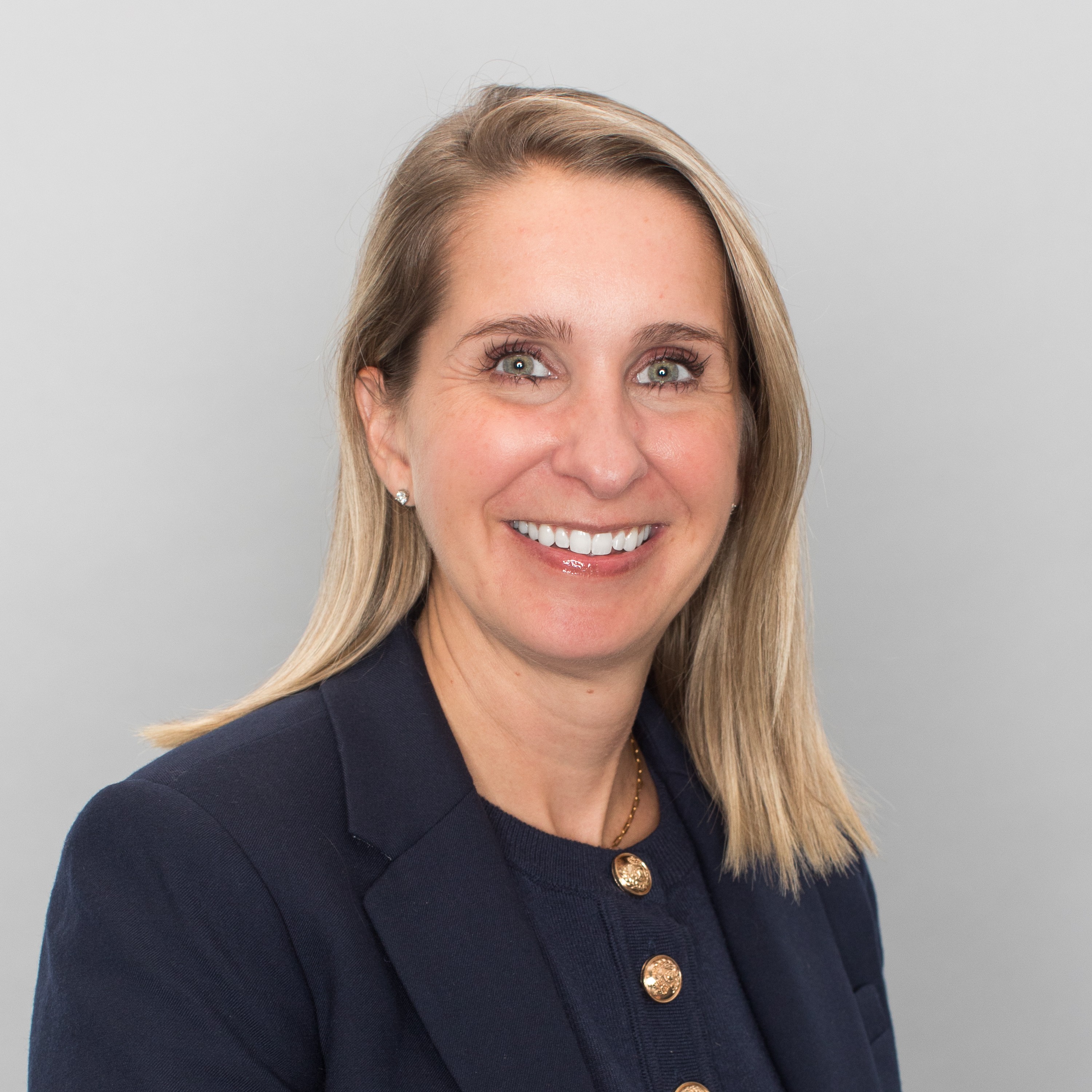 Headshot of Leah Giangrande smiling.