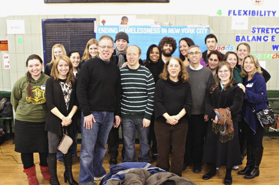 Homeless Services Commissioner Seth Diamond (left of center in black sweater with glasses) surrounded by students, faculty and alumni of Touro College’s Graduate School of Social Work. For the fourth consecutive year, the Touro volunteers canvassed parks, subways and other public spaces as part of the New York City Department of Homeless Services’ Homeless Outreach Population Estimate (HOPE).